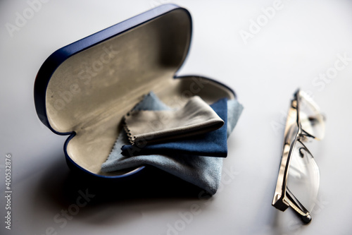 Eyeglass Cleaning Cloths with eyeglass case on gray background 