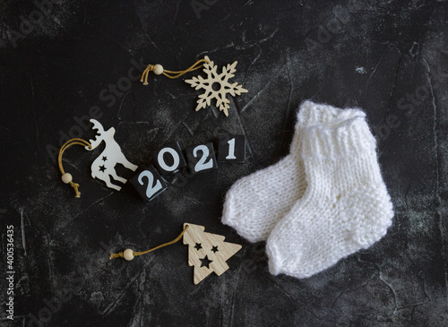 Top view knitted socks and decor. Christmas and New Year concept