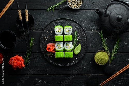 Green Sushi Rolls - With Tobiko Green Caviar and Shrimp. Traditional Japanese cuisine. Top view.
