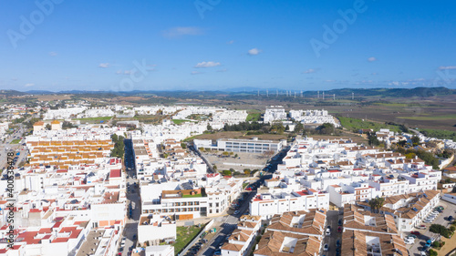 Aerial views of white town in the province of Cadiz, Andalusia. Conil de la frontera seen from above, in south Spain