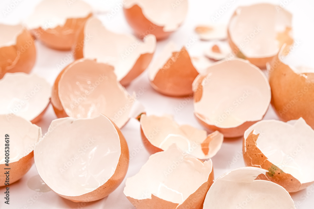 broken empty eggshells on white background broken empty eggshells on white background