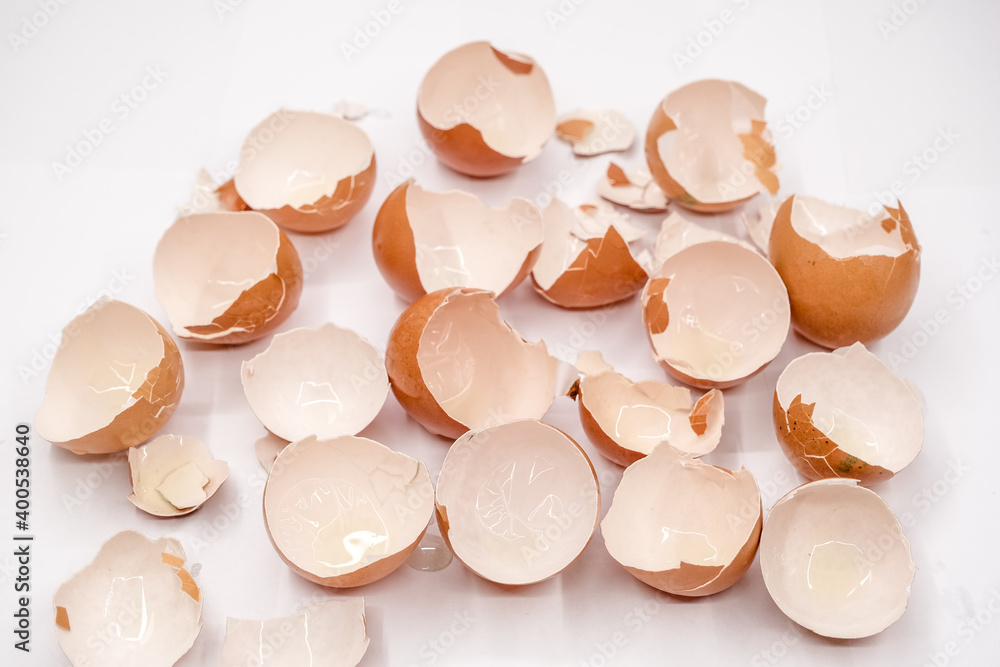 broken empty eggshells on white background broken empty eggshells on white background