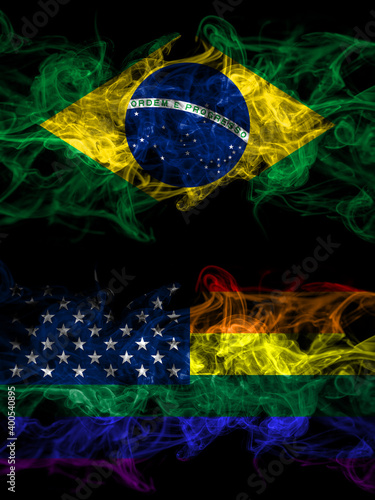 Brazil, Brazilian vs United States of America, America, US, USA, American, gay  smoky mystic flags placed side by side. Thick colored silky abstract smoke flags.