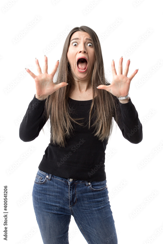 Portrait of young woman screaming with grimace of fear and shock on her face. Portrait of young woman screaming with grimace of fear and shock on her face.