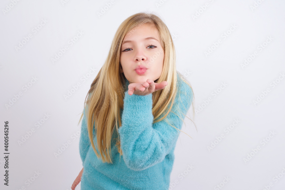 Caucasian girl blowing a kiss Caucasian girl blowing a kiss