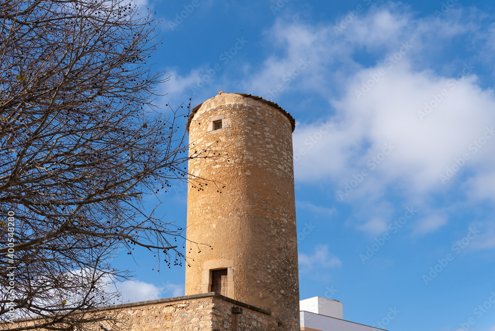 Old rustic stone mill restored on a sunny day Old rustic stone mill restored on a sunny day