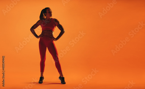 Monochrome portrait of a fit woman exercising © Jacob Lund