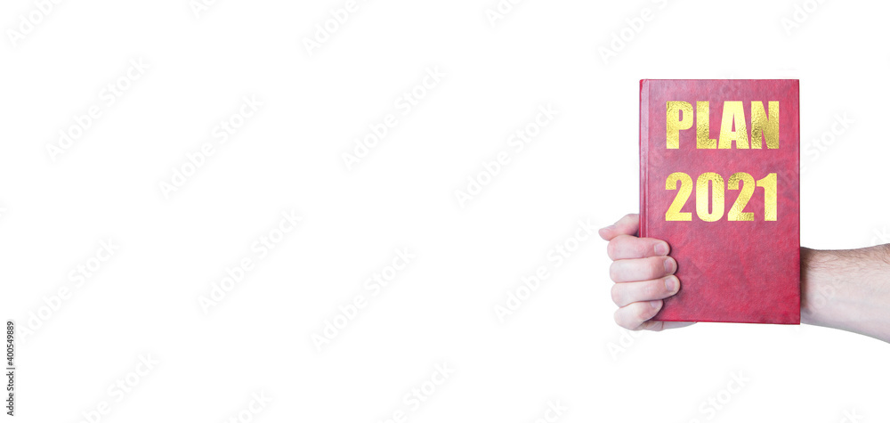 Obraz premium book in hand. knowledge concept. illustration of education. inscription on the image plan 2021