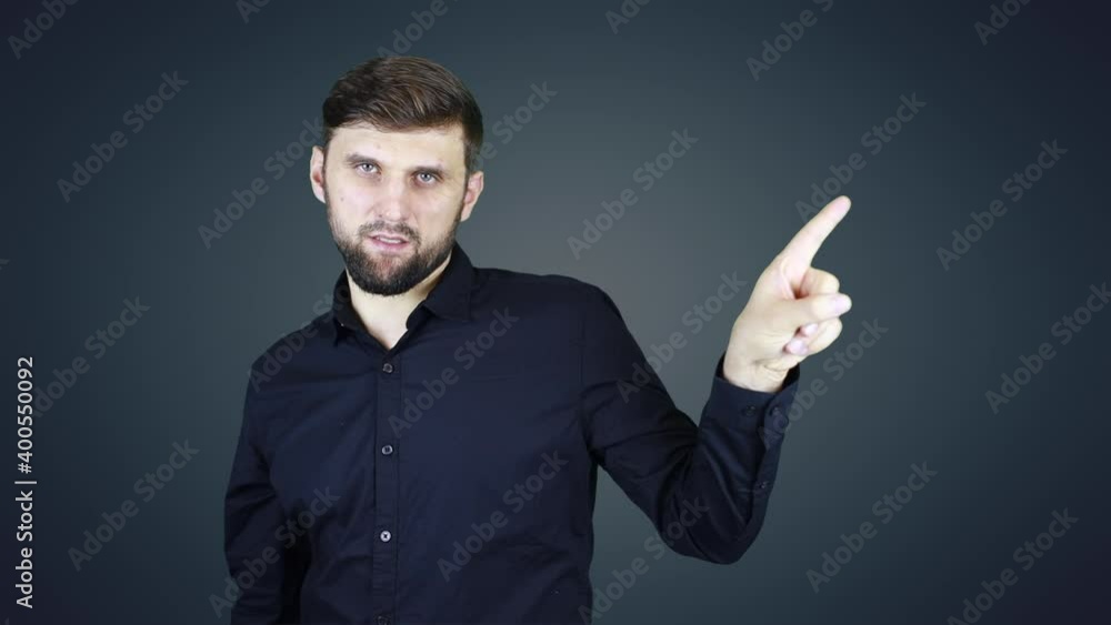 man shows direction with hand gestures