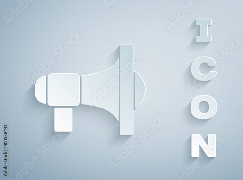 Paper cut Megaphone icon isolated on grey background. Speaker sign. Paper art style. Vector.