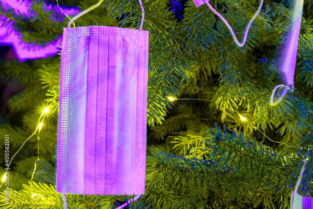 Horizontal color image with a front view of a Christmas tree decorated