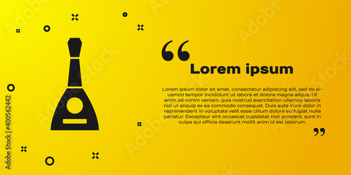 Black Musical instrument balalaika icon isolated on yellow background. Vector.
