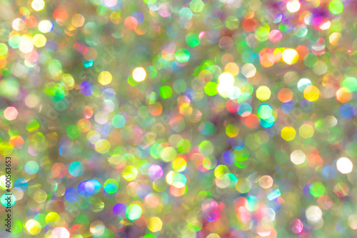 Christmas background. Blurred defocused multicolor lights. The basis for the postcard. Rear bottom background.