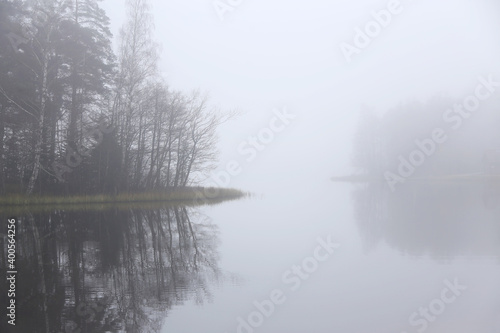 Foggy early morning on lake, horizontal picture