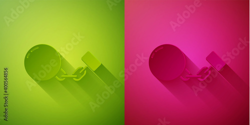 Paper cut Ball on chain icon isolated on green and pink background. Paper art style. Vector.