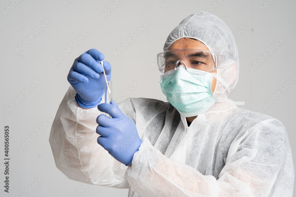 asian man doing a test for pandemic virus