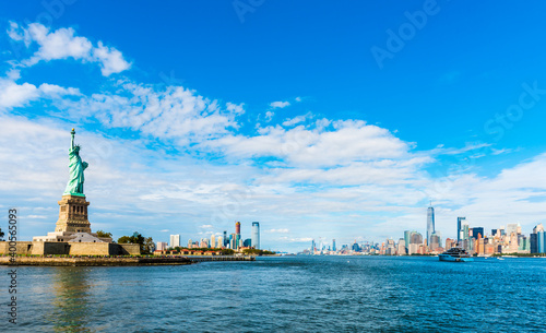 Statue of Liberty National Monument with Manhattan skyline, New York.