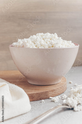 Fresh homemade crumbly cottage cheese in a large bowl