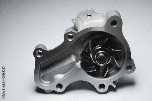 ICE liquid cooling pump. Engine coolant pump. Contrast light on gray background