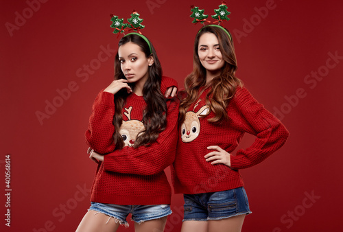 Best friends in fashion cozy winter sweater with Christmas attributes