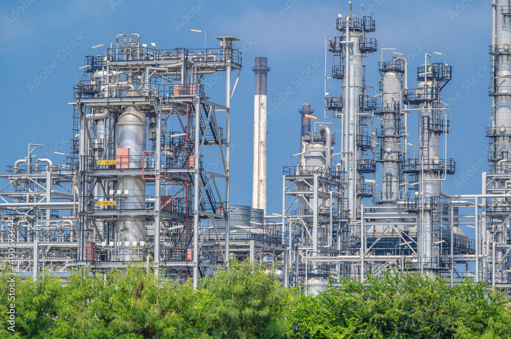 Industrial zone,The equipment of oil refining,Close-up of industrial pipelines of an oil-refinery plant,Detail of oil pipeline with valves in large oil refinery.