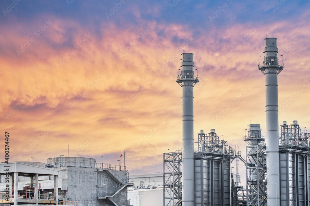 Fototapeta premium Industrial zone,The equipment of oil refining,Close-up of industrial pipelines of an oil-refinery plant,Detail of oil pipeline with valves in large oil refinery.
