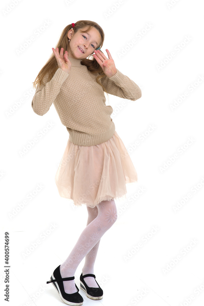 Thoughtful preteen girl. Posing against white background. Thoughtful preteen girl. Posing against white background.