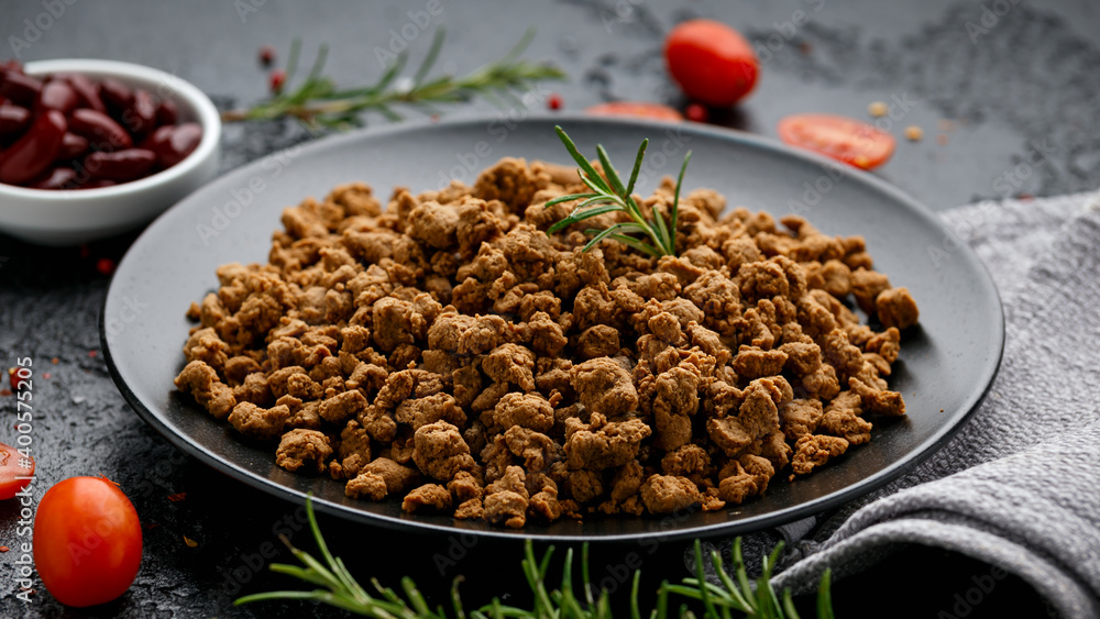 Raw vegetarian vegan protein mince as background healthy food concept Raw vegetarian vegan protein mince as background healthy food concept