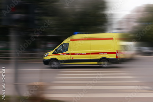 Ambulance is rushing to the patient  resuscitation is rushing to help  the movement is blurred.