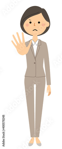 制止するスーツの女性