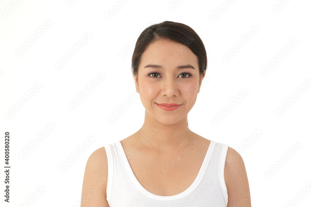 An Asian woman with a beautiful and young smile and good skin. Clean and healthy. Beauty concept. with copy space. White background An Asian woman with a beautiful and young smile and good skin. Clean and healthy. Beauty concept. with copy space. White background