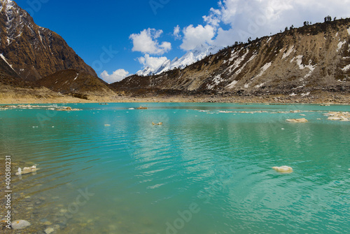 The shore of a beautiful glacial lake in the Himalayas