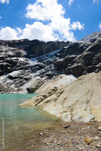 The shore of a beautiful glacial lake in the Himalayas