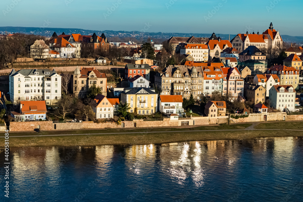 Obraz premium Meissen,Saxony, Germany. 17.02. 2019, .view from the hill to the Meissen embankment in sunny weather in early spring trees without leaves. no people
