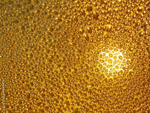 golden liquid drops background