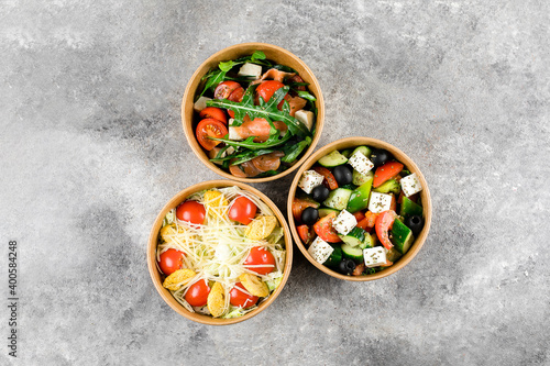 Healthy food delivery, Food Takeout. Vegetable salads in zero waste containers. Top view, flat lay