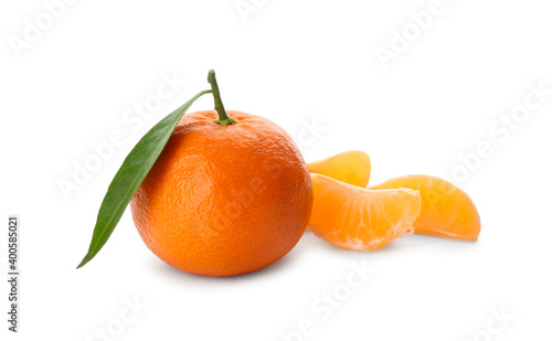 Fresh tangerines with green leaf on white background
