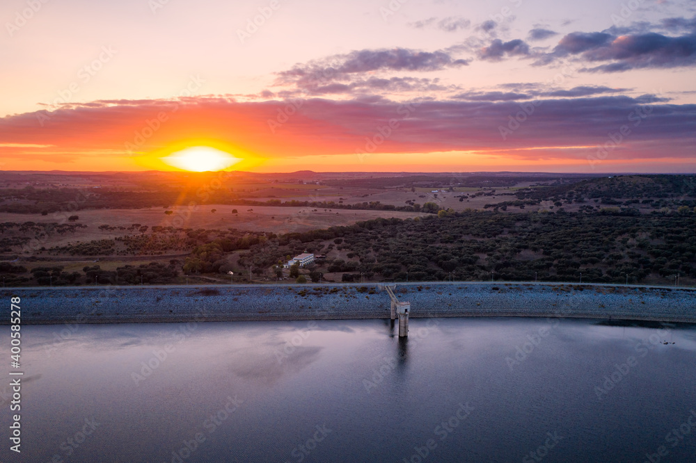 Drone panoramic aerial view of Minutos Dam in Arraiolos Alentejo at sunset, Portugal