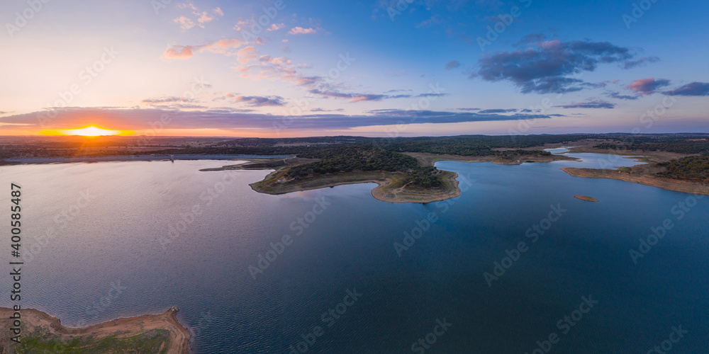 Drone panoramic aerial view of Minutos Dam in Arraiolos Alentejo at sunset, Portugal