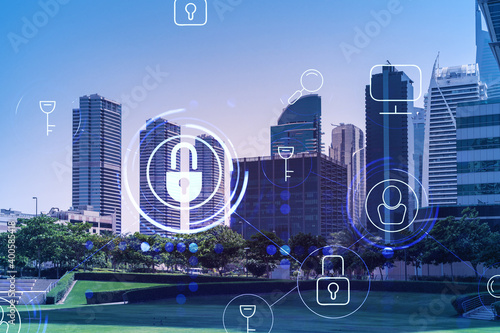 Panoramic view skyscrapers. Modern cityscape of the capital of the Emirate of Dubai. Financial services hub. Information security concept. Lock icon. Double exposure.