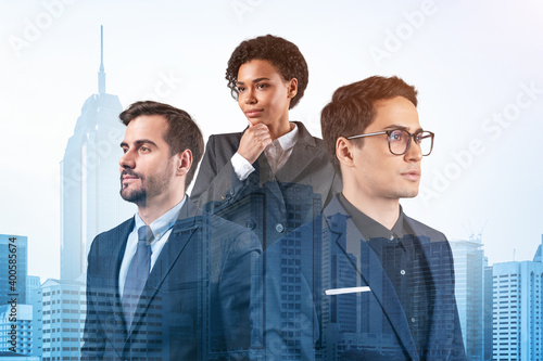 Canvas Print Group of three business colleagues in suits working and dreaming about new career opportunities after MBA