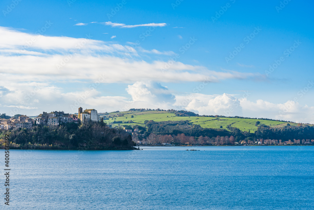 Landscape of lake, cliff and hills of the italian city called Anguillara