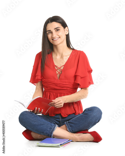 Young woman with copybooks ...