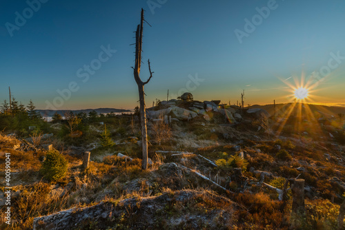 Sunrise on Plechy hill in winter sunny cold morning photo