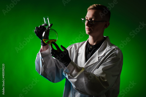 Chemist with a flask. A che...