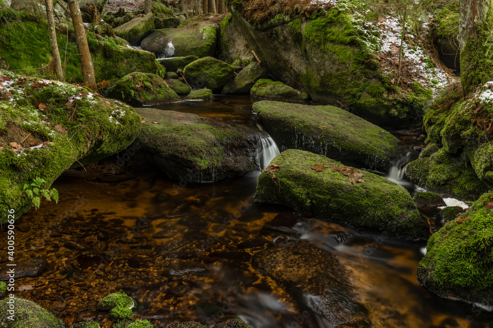 Konsky creek in National park Sumava with cascade and waterfall Konsky creek in National park Sumava with cascade and waterfall