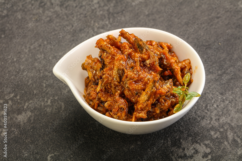 Canned anchovy in tomato sauce