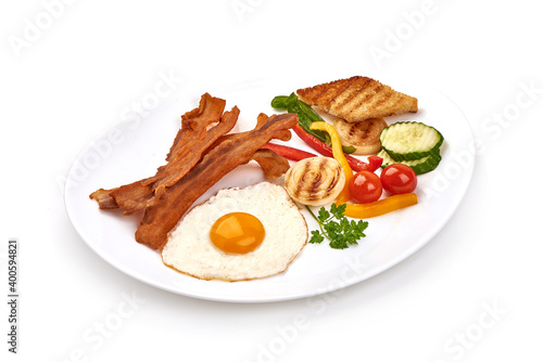 Fried Bacon with eggs, american breakfast, isolated on white background