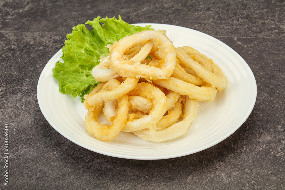 Roasted squid rings with salad