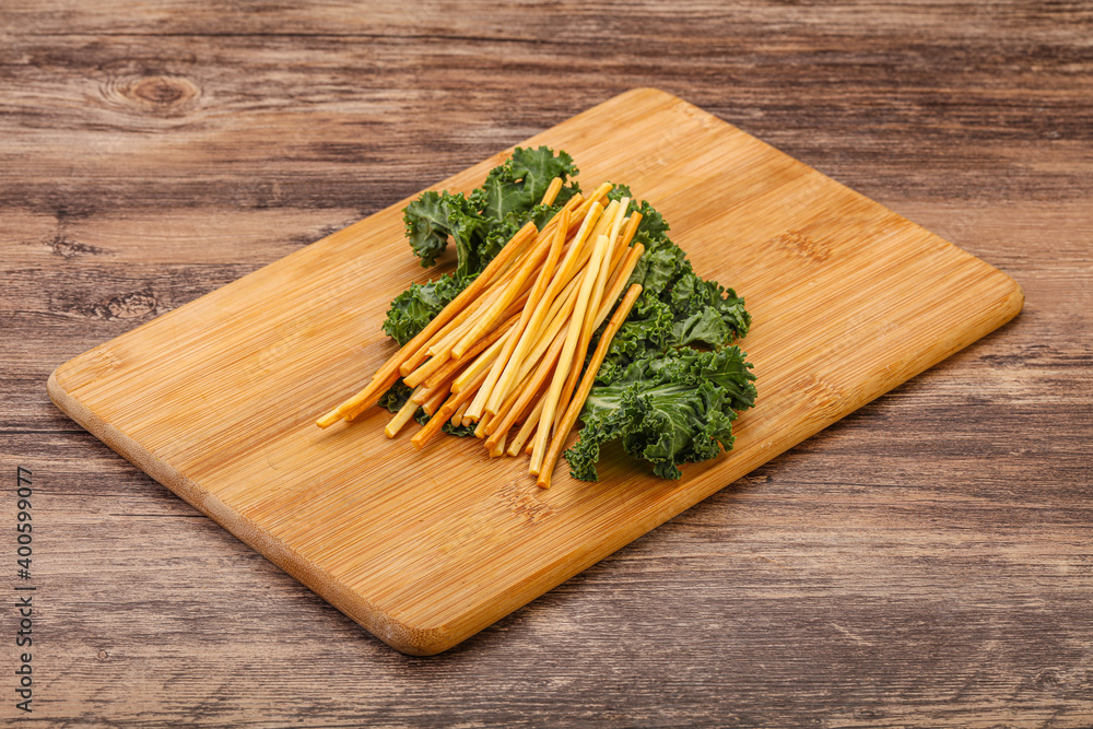 Chechel cheese sticks over board